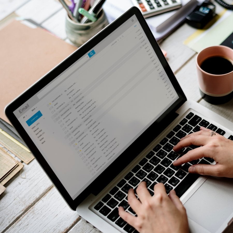Businesswoman Checking E mail Online on Laptop